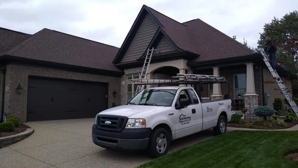 Slide of G/M Roofing & Gutter Topper