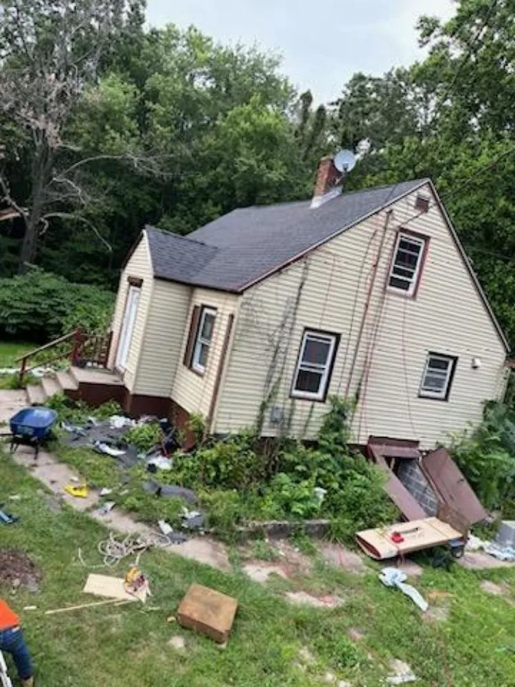 Slide of GM Roofing & Siding