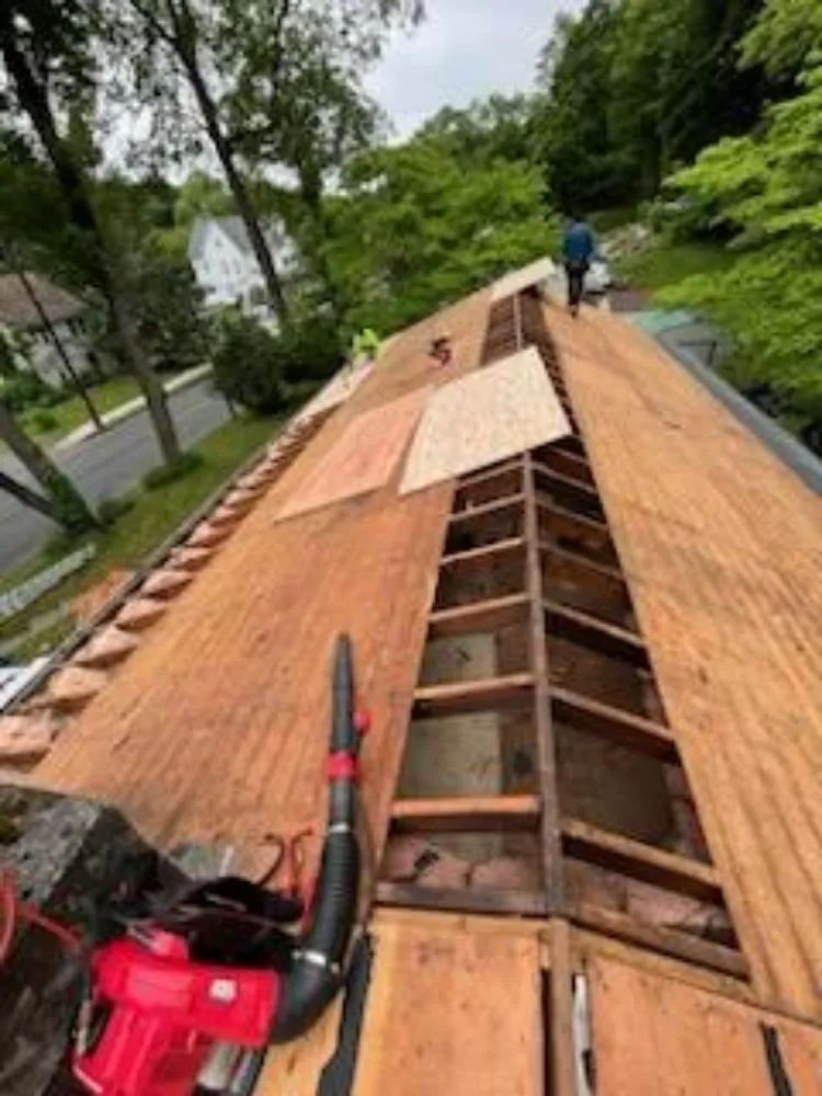 Slide of GM Roofing & Siding