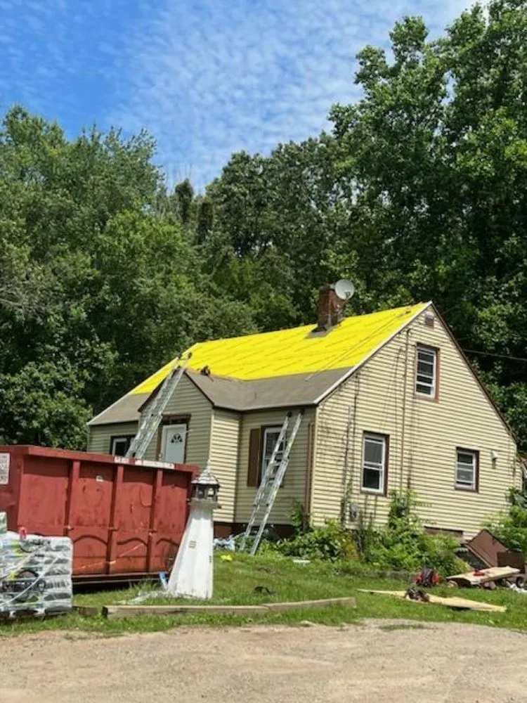 Slide of GM Roofing & Siding