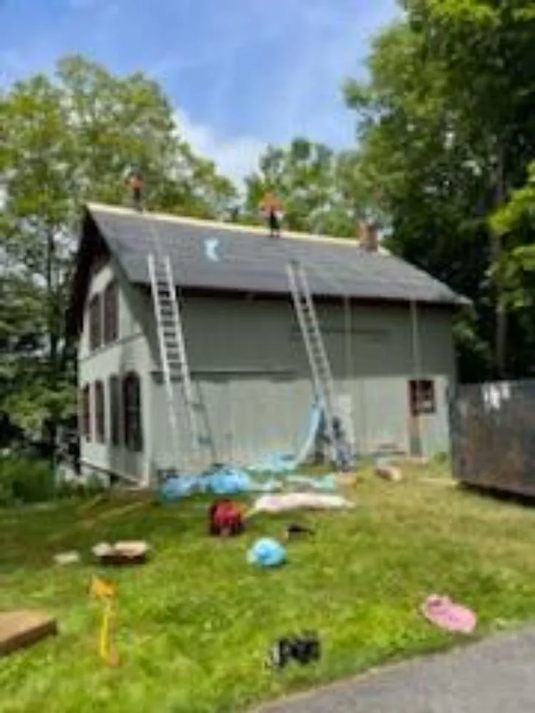 Slide of GM Roofing & Siding