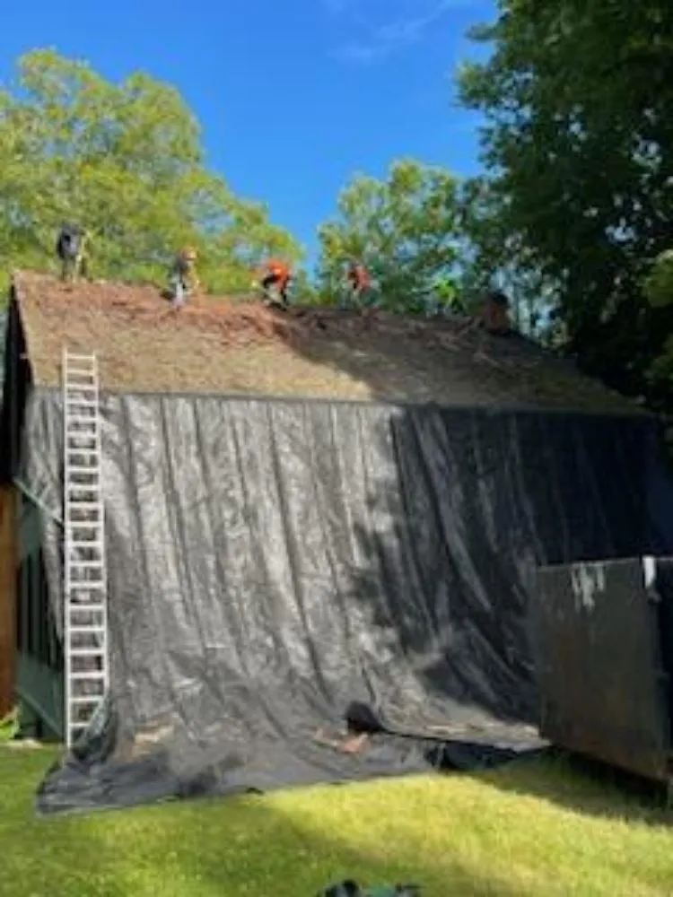 Slide of GM Roofing & Siding