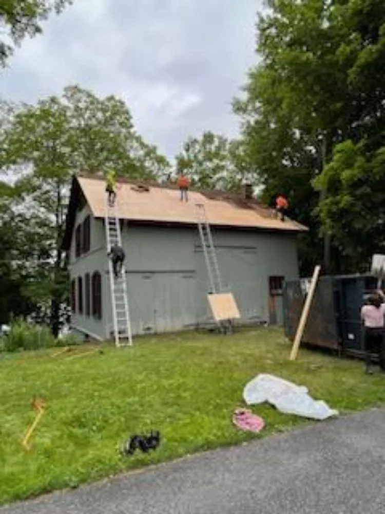 Slide of GM Roofing & Siding