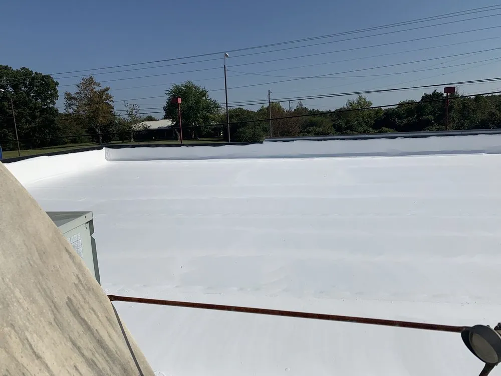 Slide of GM roofing and painting