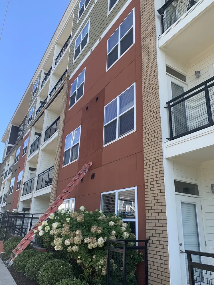 Slide of GM roofing and painting