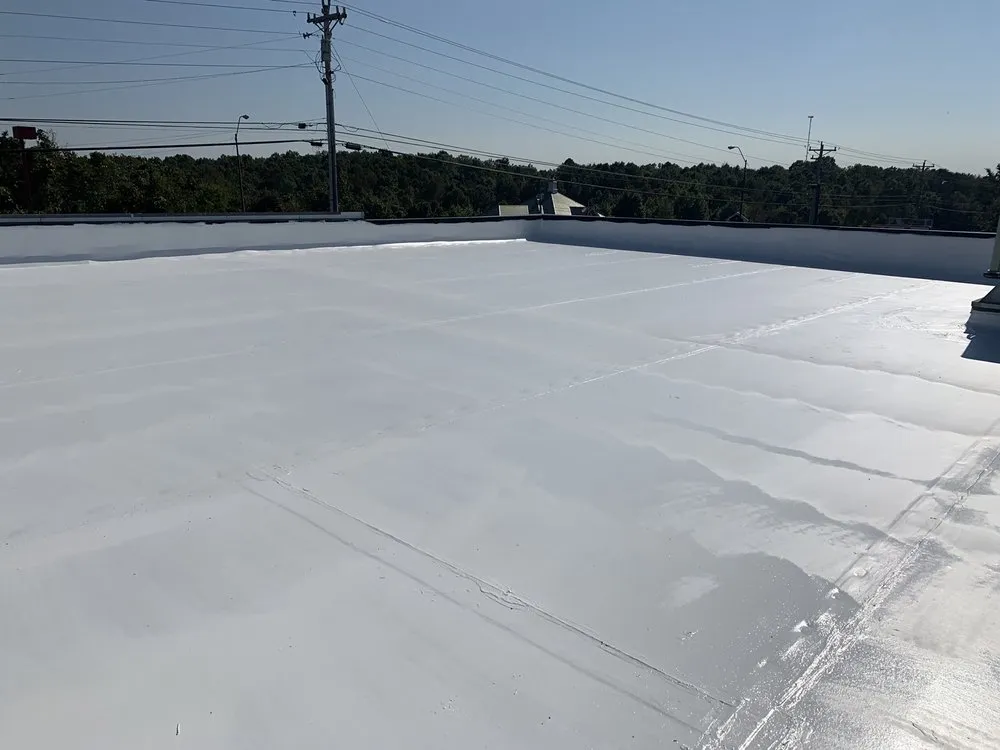 Slide of GM roofing and painting