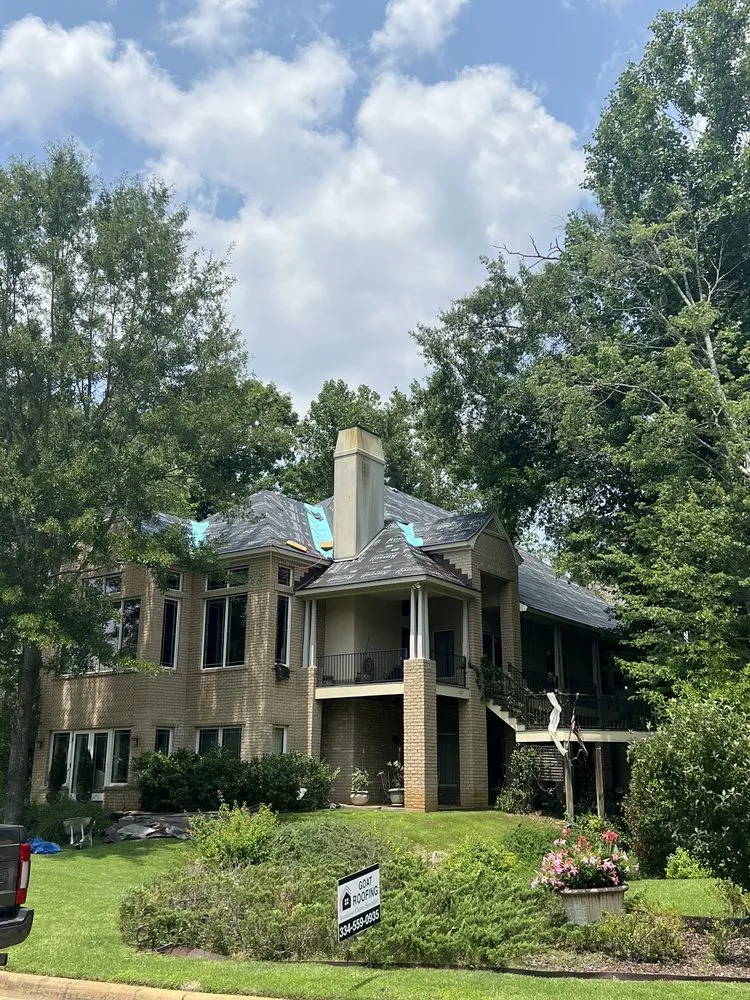 Slide of Goat Roofing