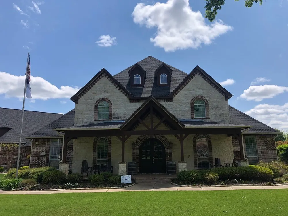 Slide of GOAT Roofing