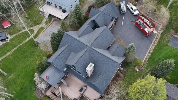 God Loves Us Construction Logo