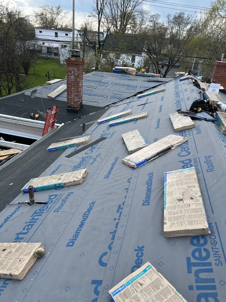 Slide of Gold Construction Roofing contractor