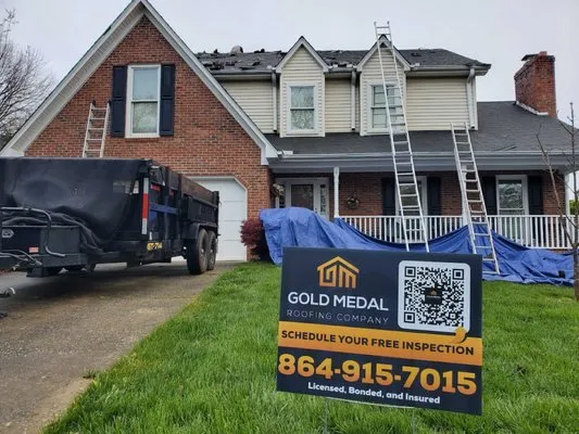 Gold Medal Roofing Company Logo