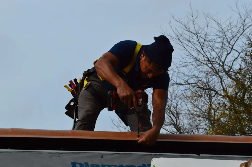 Slide of Golden Group Roofing