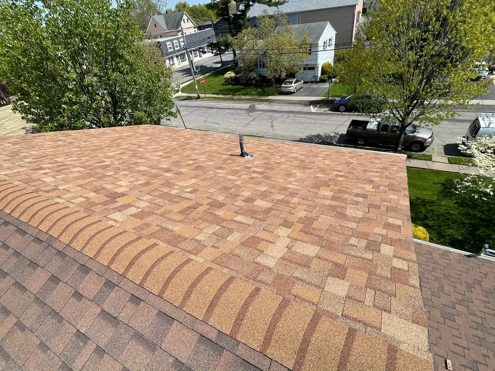 Slide of Golden Master Roofing