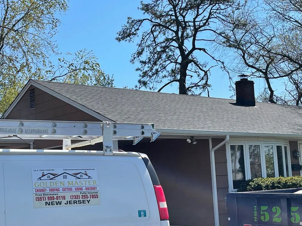 Slide of Golden Master Roofing