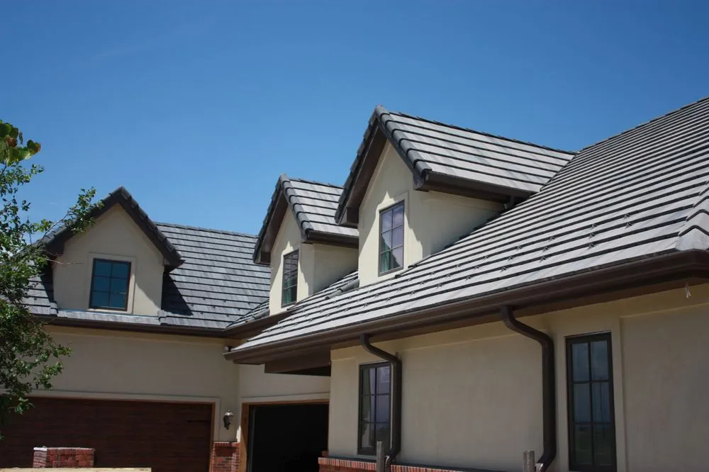 Slide of Golden Spike Roofing