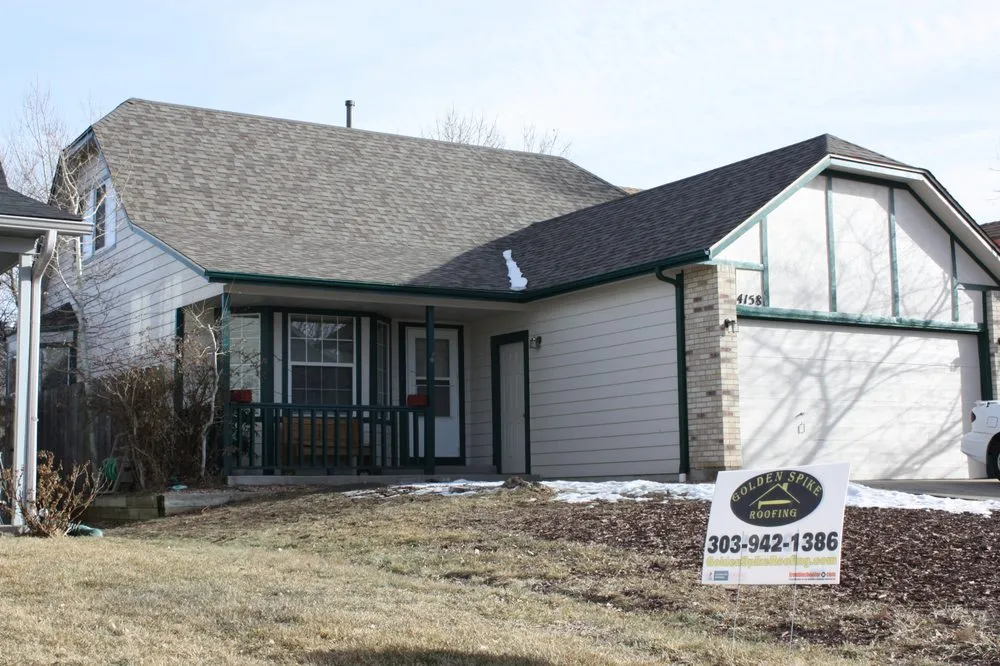 Slide of Golden Spike Roofing