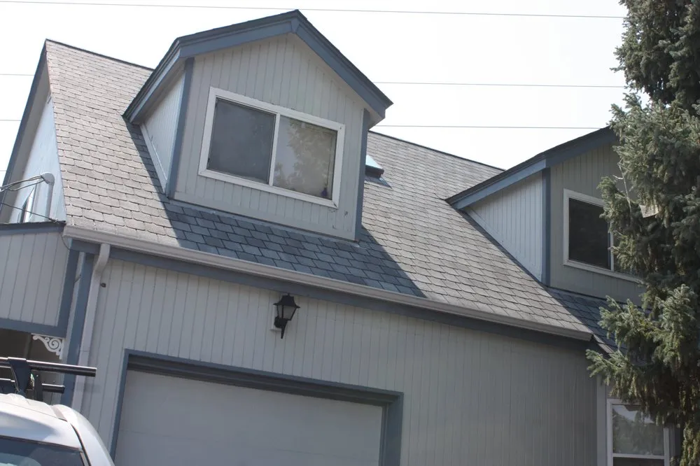 Slide of Golden Spike Roofing