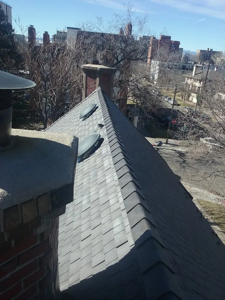 Slide of Golden Spike Roofing
