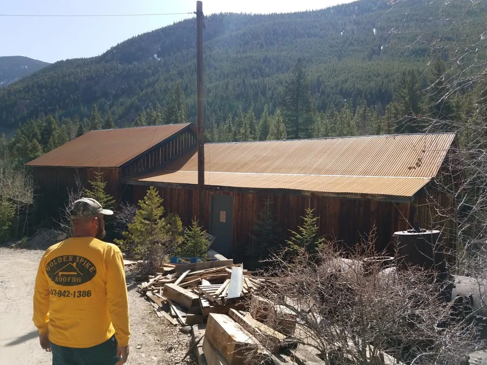 Slide of Golden Spike Roofing