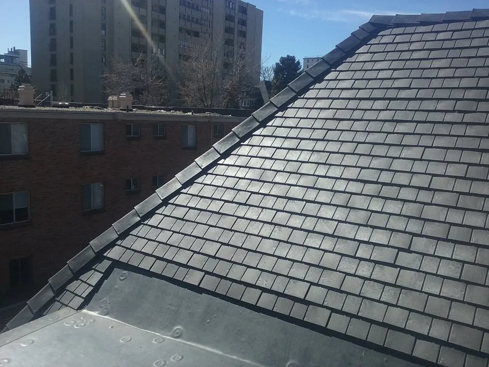 Slide of Golden Spike Roofing