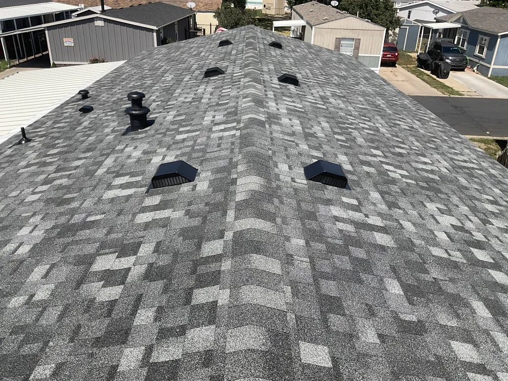 Slide of Golden Spike Roofing