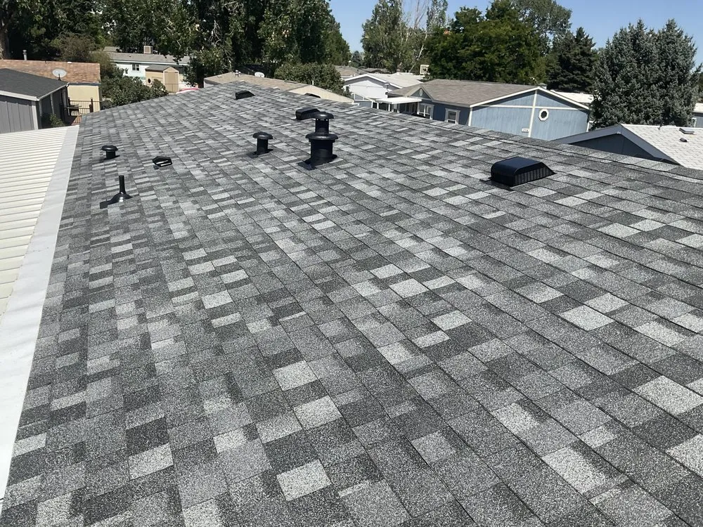 Slide of Golden Spike Roofing