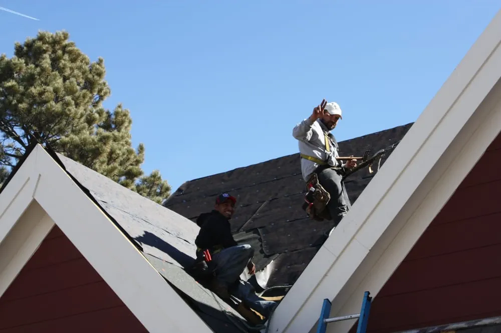 Slide of Golden Spike Roofing