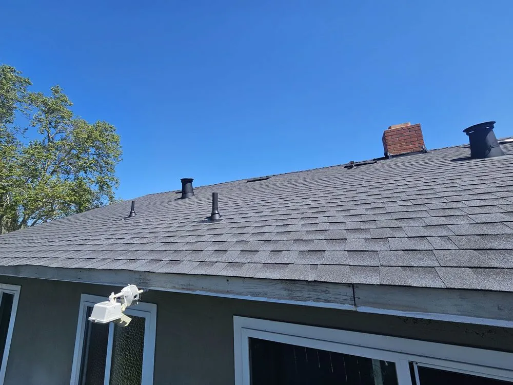 Slide of Golden Top Roofing
