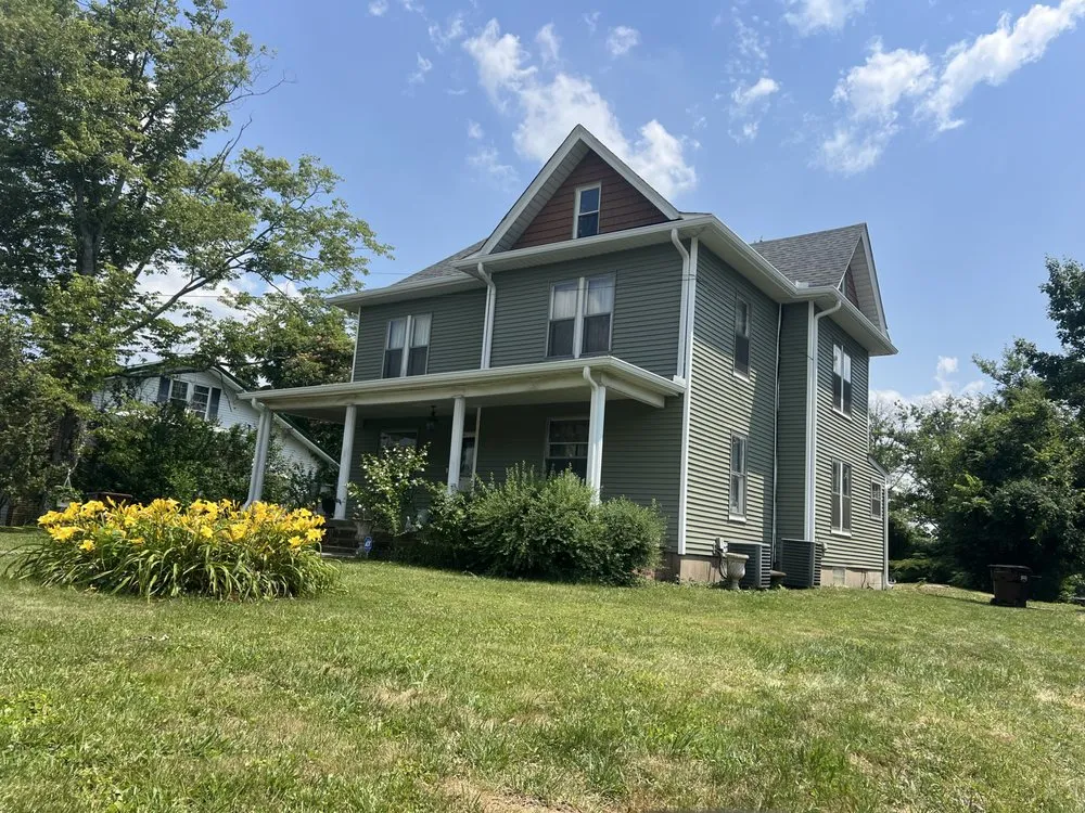 Slide of Golden Triangle Roofing