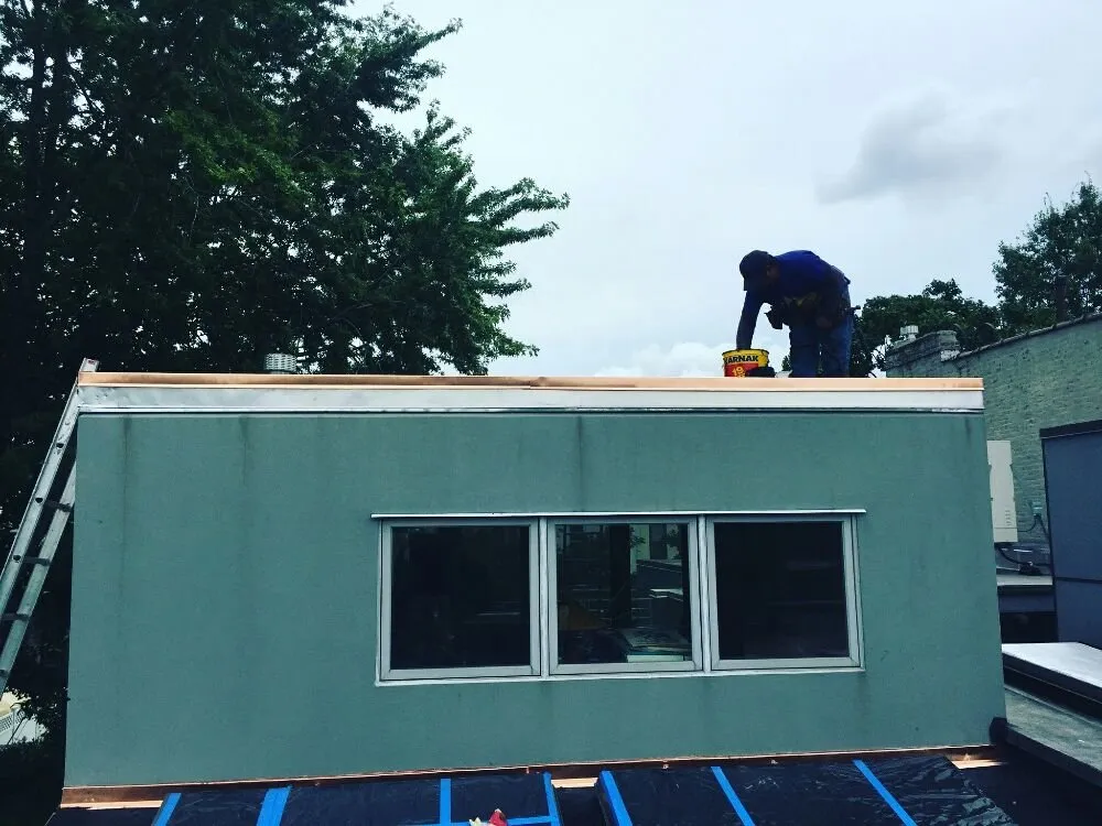 Slide of Goldenberg Roofing