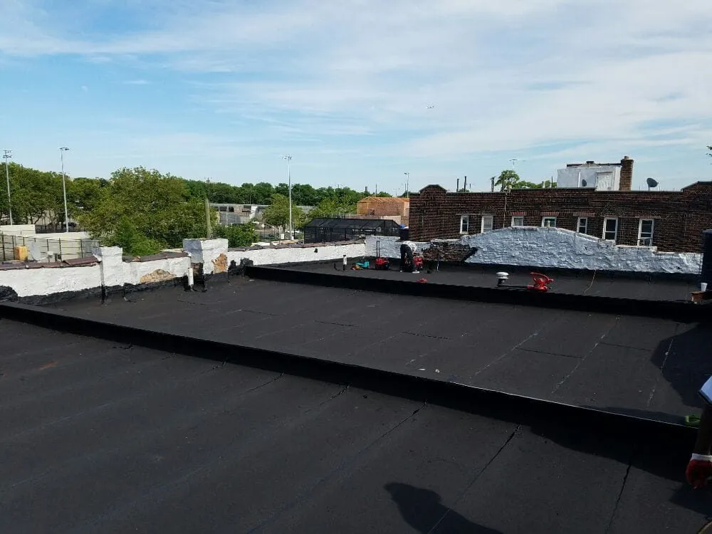 Slide of Goldenberg Roofing NYC