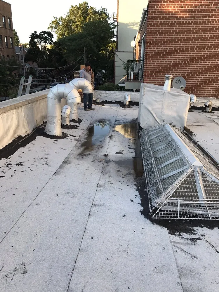 Slide of Goldenberg Roofing NYC