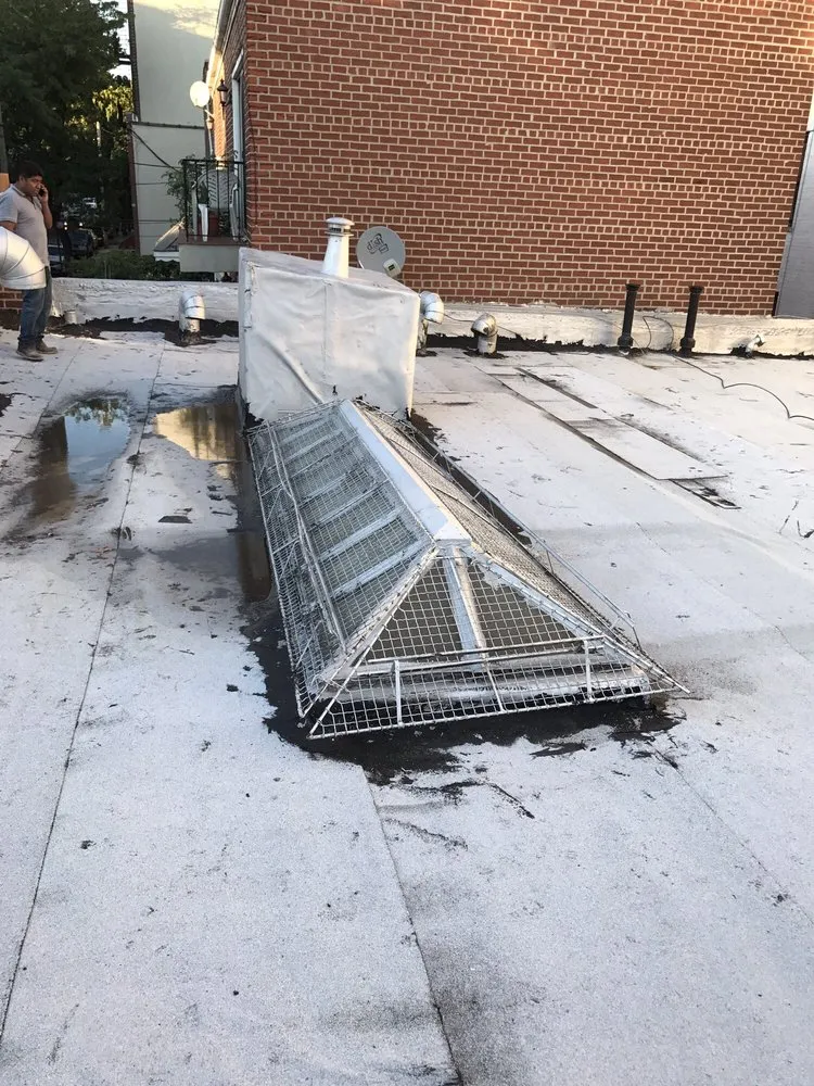 Slide of Goldenberg Roofing NYC