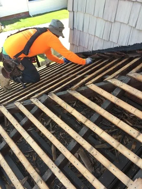 Slide of Goldman Roofing