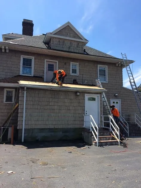 Slide of Goldman Roofing