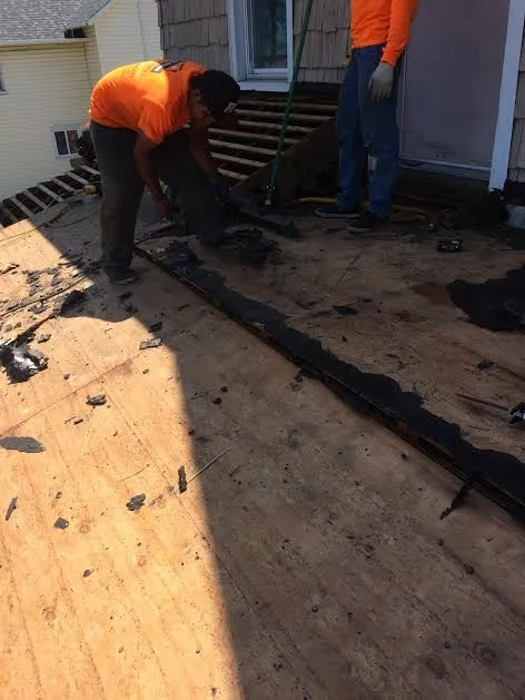 Slide of Goldman Roofing