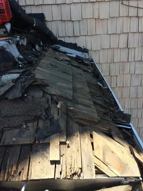 Slide of Goldman Roofing