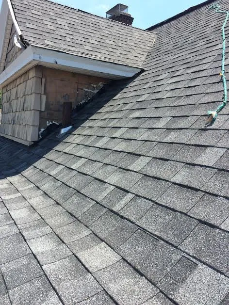 Slide of Goldman Roofing