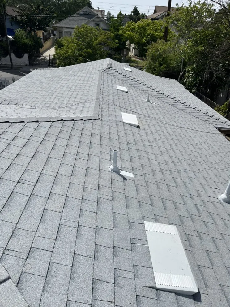 Slide of Goliath Roofing