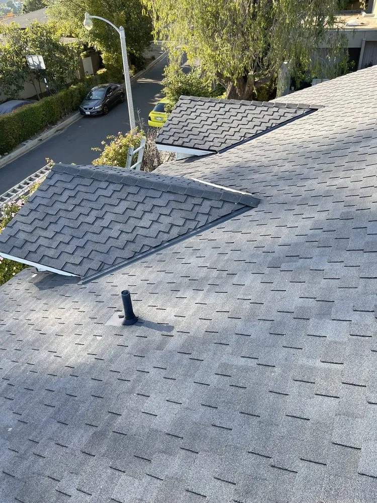 Slide of Goliath Roofing