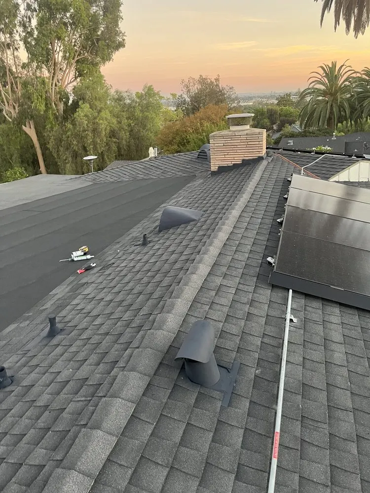 Slide of Goliath Roofing