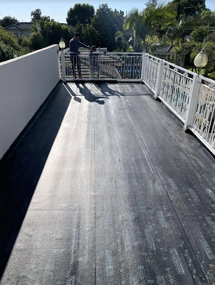 Slide of Goliath Roofing