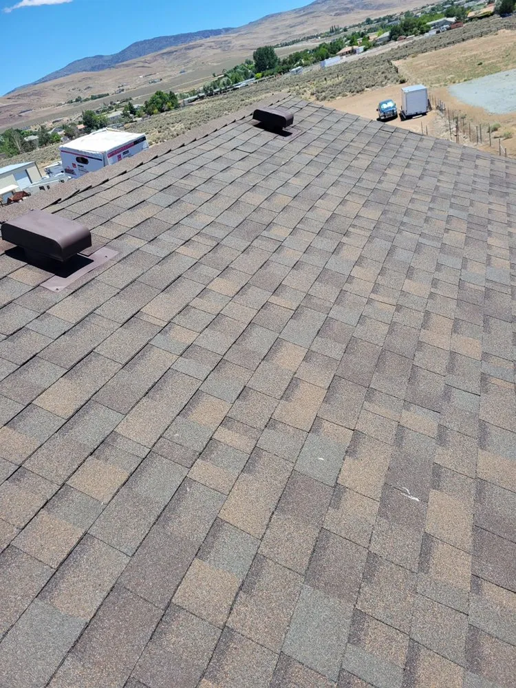 Slide of Gomez Roofing