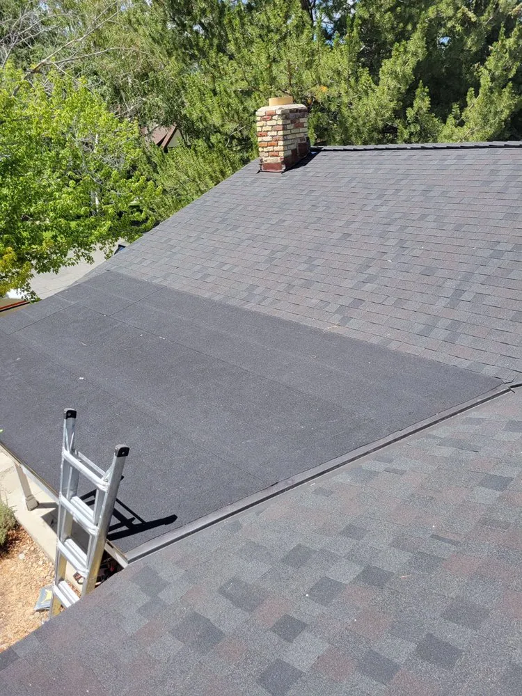 Slide of Gomez Roofing