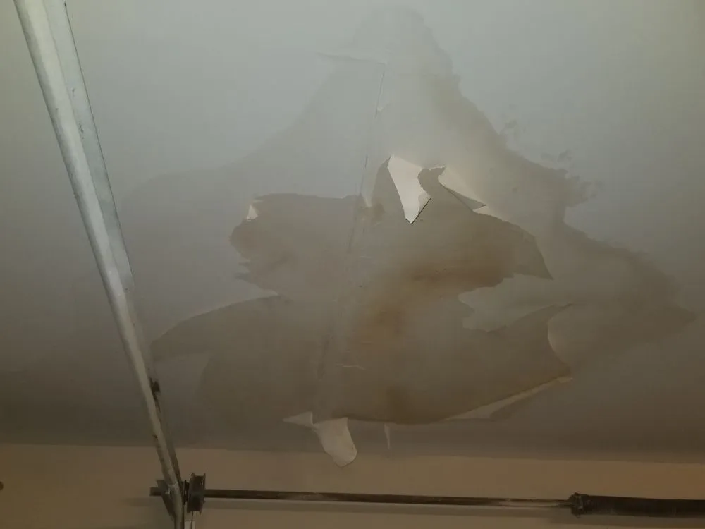 Slide of Gomez Roofing Solutions