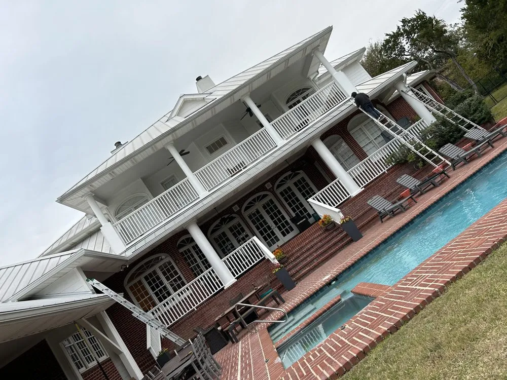 Slide of Gonzalez Seamless Rain Gutters