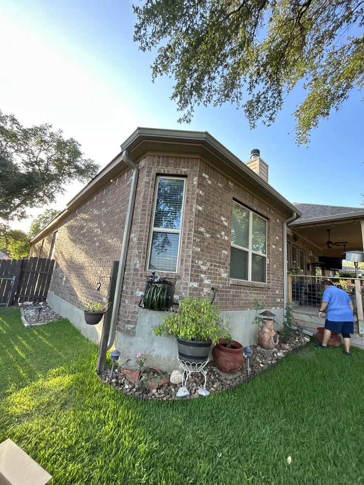 Slide of Gonzalez Seamless Rain Gutters