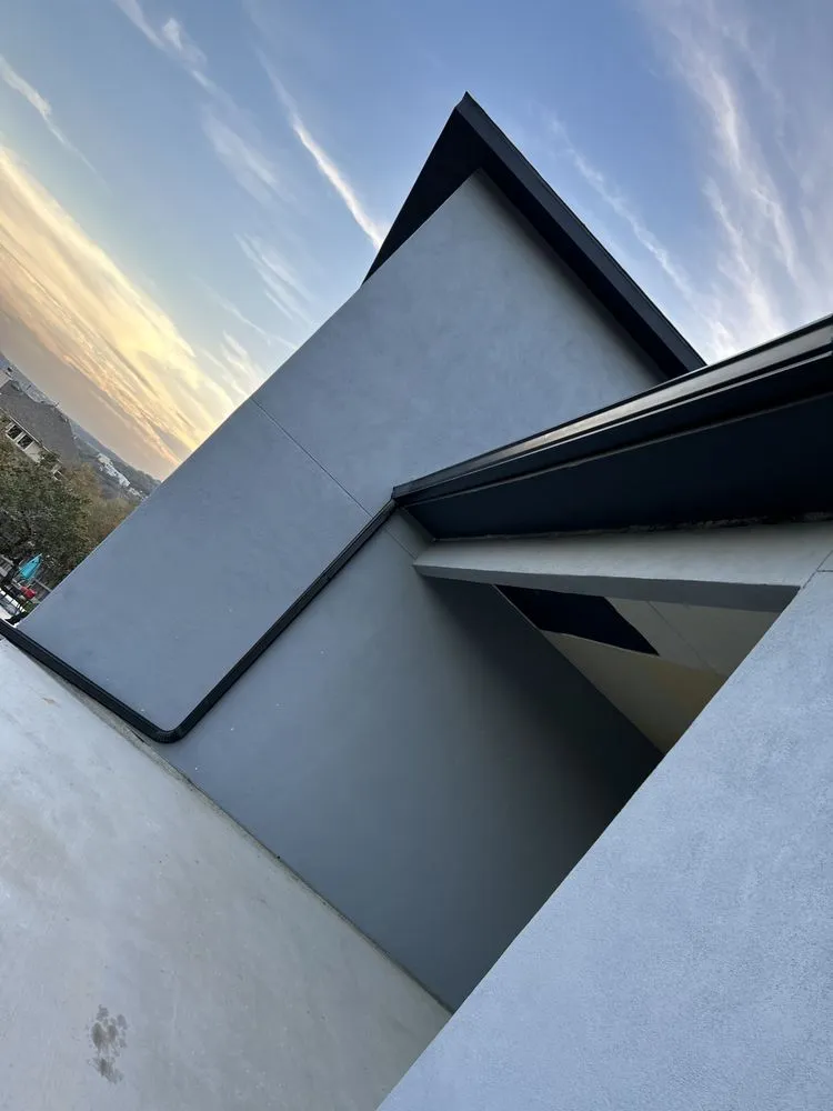 Slide of Gonzalez Seamless Rain Gutters