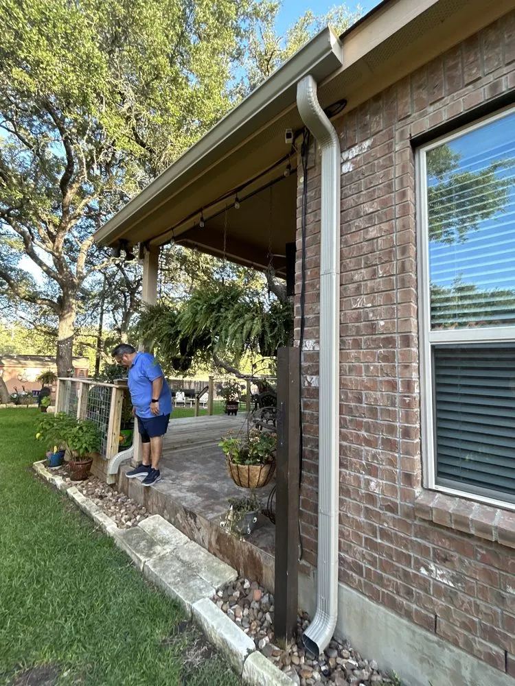 Slide of Gonzalez Seamless Rain Gutters