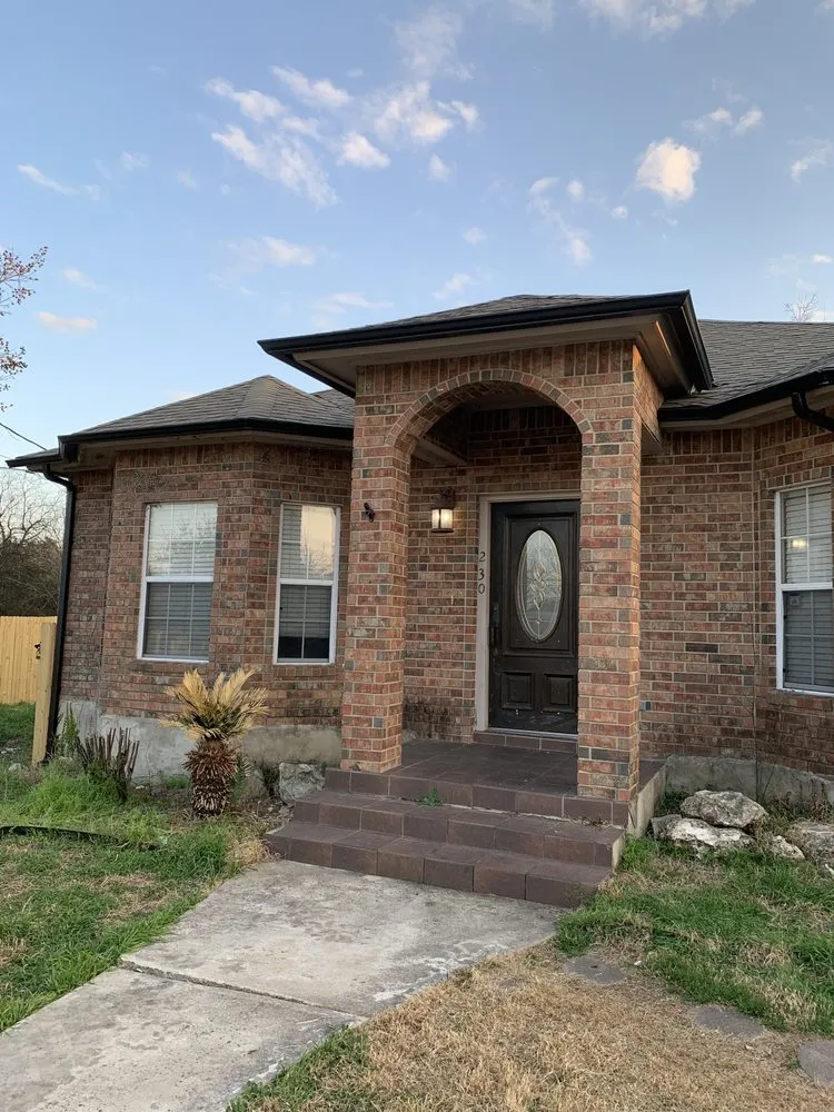 Slide of Gonzalez Seamless Rain Gutters